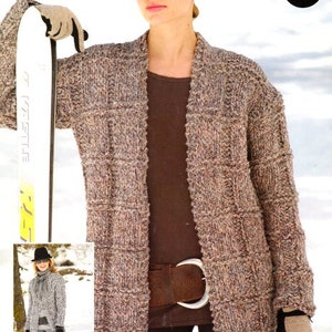 May include: A brown and beige knitted cardigan with a wide collar and a belt. The cardigan has a checkered pattern and is worn over a brown t-shirt. The model is wearing sunglasses and gloves. The text "easy knit" is visible in the upper right corner of the image.