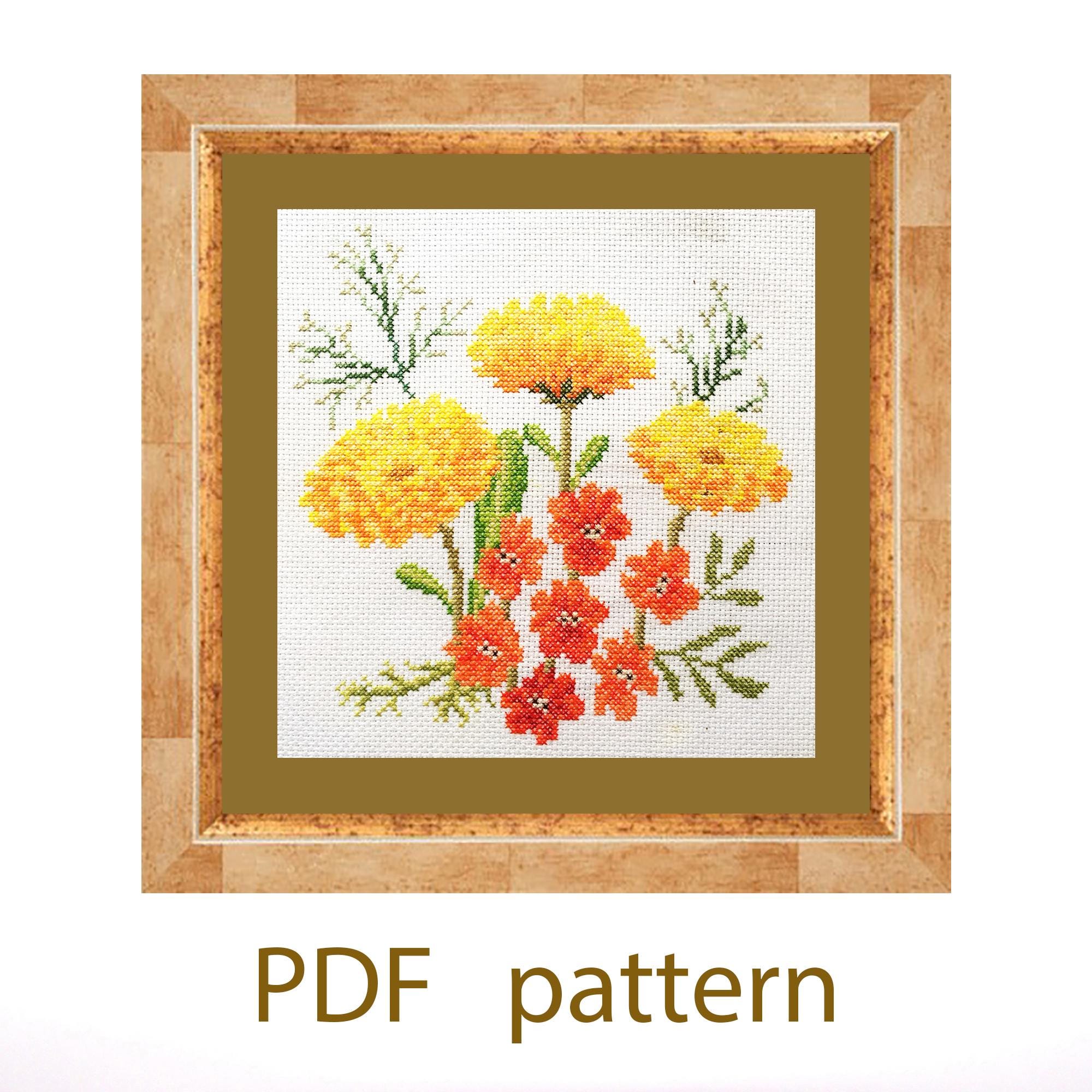 Point de croix fleur bleue et orange - Petit Citron