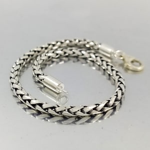 Pulsera de plata de ley de 3 mm hecha a mano con diseño de trigo trenzado. Para hombre y mujer.