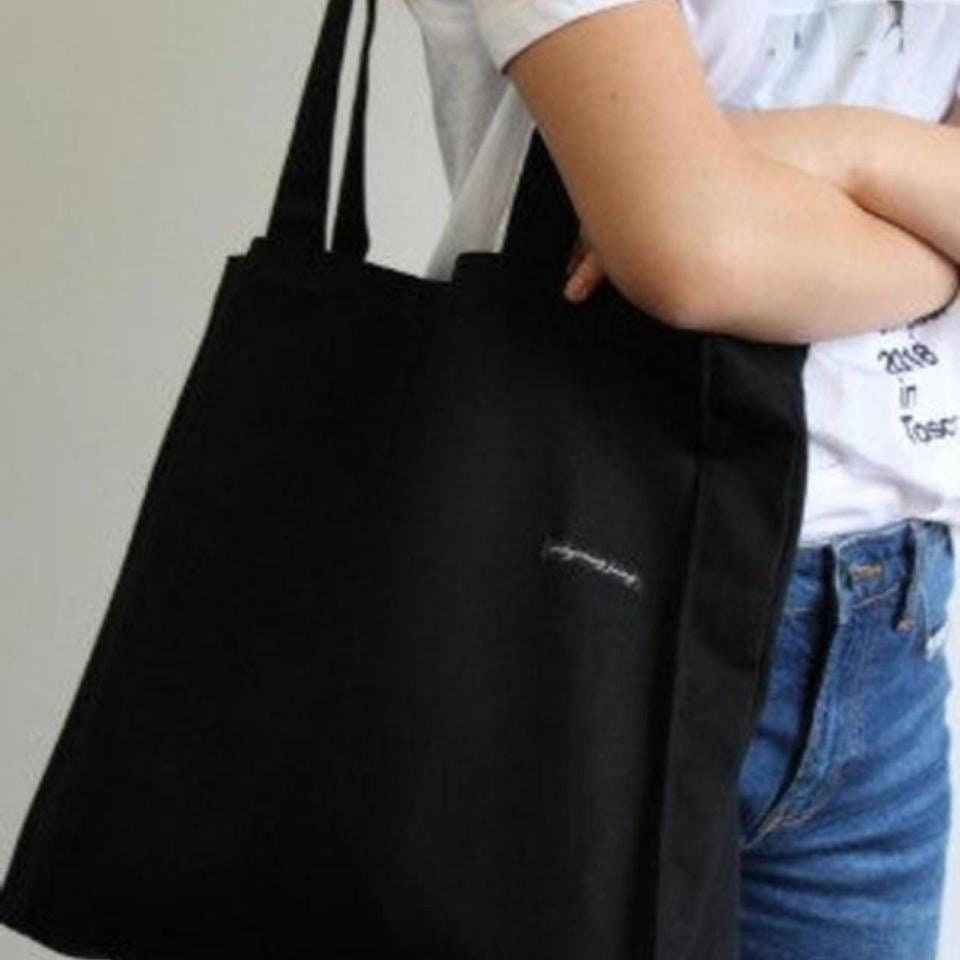 Black canvas tote bag with pockets deals