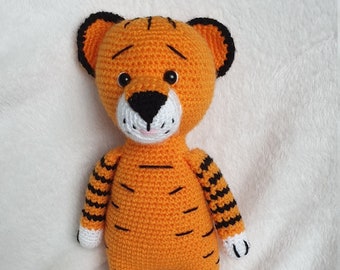 Toby the friendly tiger. Quality handmade crochet soft toy.