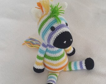 Iris the colourful striped zebra. Handmade quality crochet soft toy.