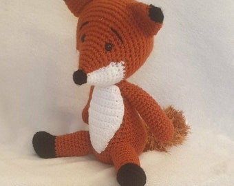Felix fabulous friendly fox cub with bushy tail. Quality handmade crochet soft toy.