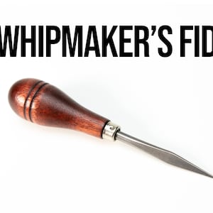 May include: A brown wooden handled tool with a metal needle called a "whipmaker's fid".