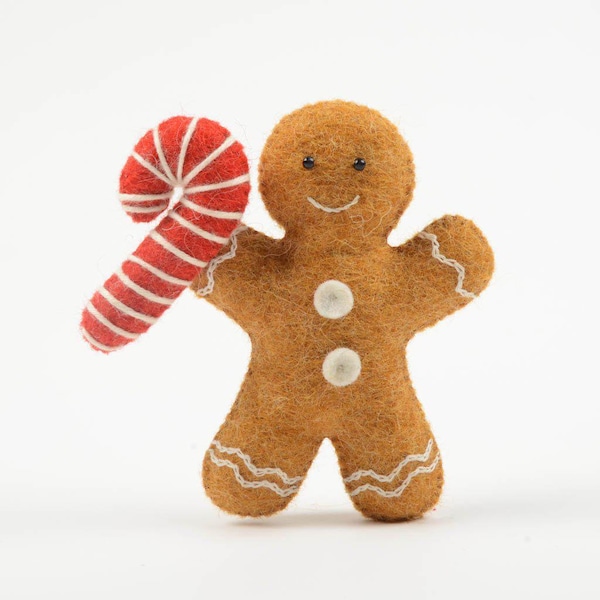 Biscuit de pain d’épice avec ornement de canne à sucre, charme de cuisson de vacances feutré à la main, décor de Noël classique fait à la main