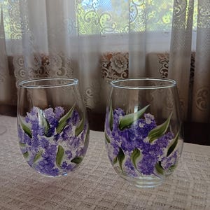 Hand painted stemless wine glasses with purple flowers and green leaves - set of two