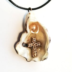 Religious pendant goldbronze cross 1 white freshwater pearl on an oyster shell crystal resin black leather cord beachcombing image 1