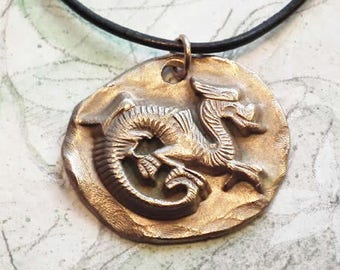 Unisex pendant, goldcolor bronze taoist/medieval Dragon + black leatherstrap (copper or silver color bronze too)