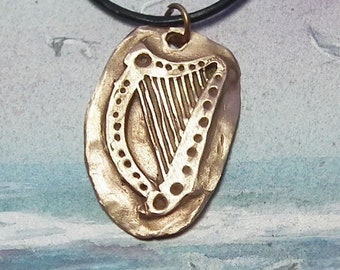 Pendant Gold Bronze Celtic  Harp pendant Musical Irish unisex jewellery black leather also available in silver bronze or copper