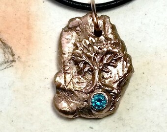 Unisex Pendant , meteorit handmade in goldbronze with an Yggdrasil, Celtic/viking Tree of life & a blue CZ zirconia, for men and women