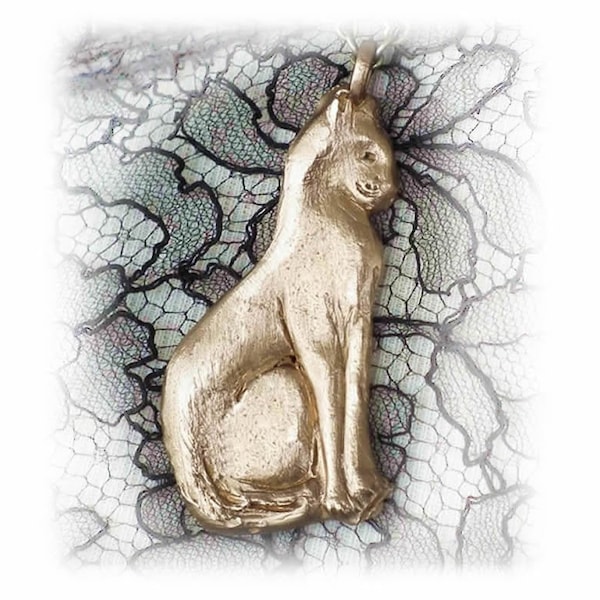 Pendentif chat assis  en bronze couleur or  ou en cuivre , chat égyptien, sur  lien de cuir noir