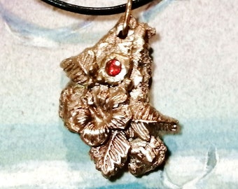 Unisex Pendant ,  handmade bronze meteorit with an hisbiscus flowers & a red  CZ zirconia, for men and women , black leather cord