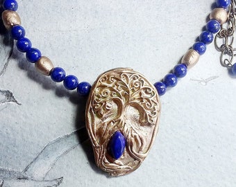 Cetic/viking/wicca  necklace  Yggdrasil in bronze, the Celtic Tree of life with a Lapis lazuli cab  and real Lapis lazuli  & bronze beads