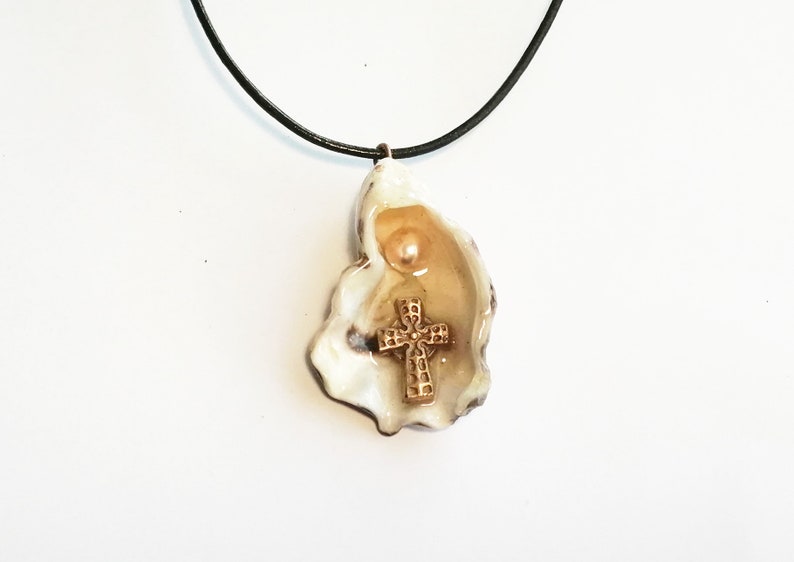 Religious pendant goldbronze cross 1 white freshwater pearl on an oyster shell crystal resin black leather cord beachcombing image 2