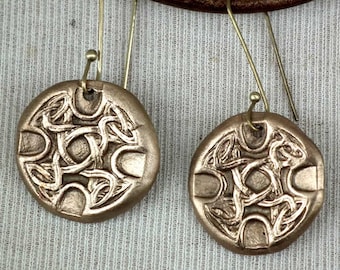 Celtic bronze earrings, I decorated   with  celtic knots. On commission, i can  make them in copper or in white bronze