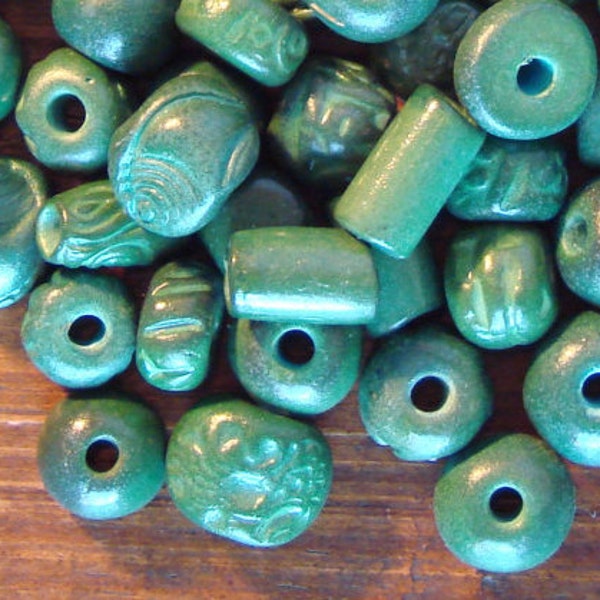 25 Hand-Made Ceramic Beads in Assorted Shapes in Jade Tones.