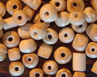 25 Hand-Made Ceramic Beads, Assorted Shapes in Ivory-Bone Tones.