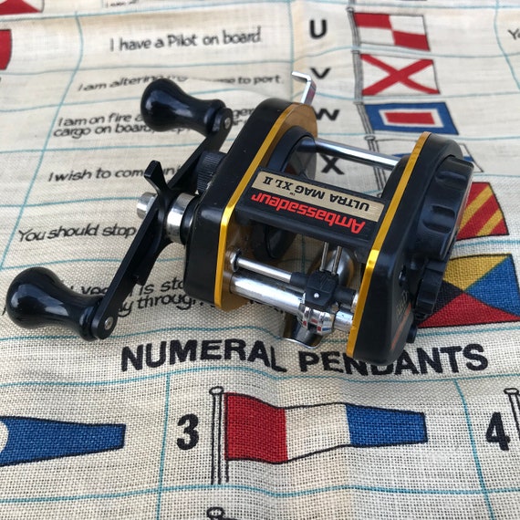 custom fishing reel penn International VI Autostop Electric Reels Silver / 80 The Fathom Electric is scrimshaw bone pendant Size:6 - 5/8 oz Fish Phone Strap -