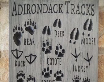 Adirondack animal Tracks Carved wood sign