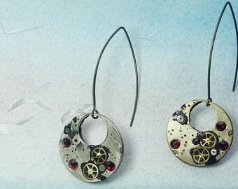 Steampunk earrings, art-deco, gustav Klimt style, made of  cogs/gears, black resin &   red swarovski crystal cabs.