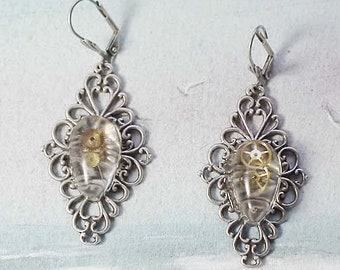 Steampunk jewelry,  Earrings made of silver  colour  filigree with resin cabs and watch gears  for pierced or unpierced ears