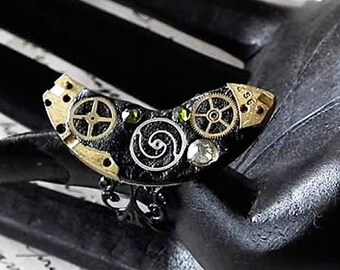 Ajustable handmade steampunk ring, Gustav Klimt style,black filigree, black resin,  gears+ green Swarovski crystal cabs ,unique piece