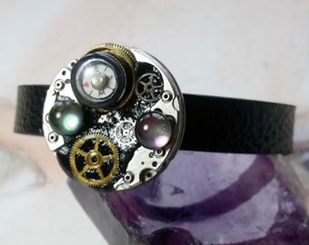 Steampunk/Art-deco, Gustav Klimt Style bracelet, black strap, brass and steel watch part & cogs , compass,black, resin, vintage glass cabs