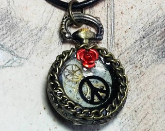 Unisex Steampunk pendant, peace & love, little pocket watch case, dial, gears, resin, red metal flower, black leather cord, for men or women
