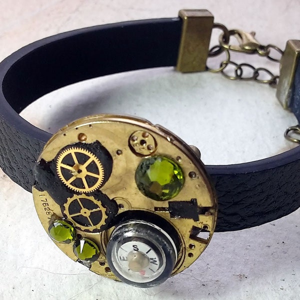 Steampunk/Art-deco, Gustav Klimt Style bracelet, black strap,  brass watch part & cogs , compass,black, resin, green Swarovski crystals
