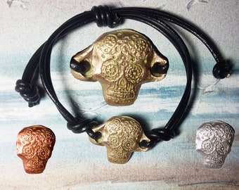 Unisex ajustable steampunk-gothic bracelet, goldbronze or copper mexican skull+black leather , for men, women, teenagers