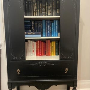 Custom personalized books, themed books, book decor, pride book stack, interior design, sustainable design, books, variety of colours