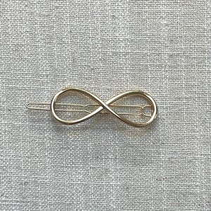 Golden Infinity Hair Barrette: Geometric Alloy Hair Clip