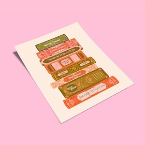 Pode incluir: Uma impressão artística retangular com uma pilha de lombadas de livros ilustradas em tons de verde-oliva, coral e laranja. As lombadas exibem vários títulos, incluindo "You Will Be The Death Of Me" e "Only I Get To Touch You" em fontes decorativas.