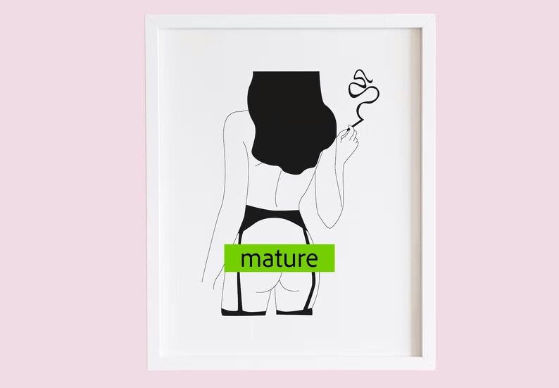 May include: Black and white line art print of a person in lingerie, smoking a cigarette. The word "mature" is in a green rectangle. The art is framed in a white frame.