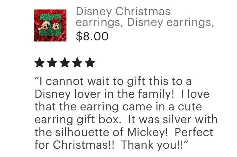 May include: A pair of Christmas-themed earrings featuring Mickey Mouse and Minnie Mouse. The earrings are displayed in a small gift box with a silver Mickey Mouse silhouette. "I cannot wait to gift this to a Disney lover in the family! I love that the earring came in a cute earring gift box. It was silver with the silhouette of Mickey! Perfect for Christmas!! Thank you!"