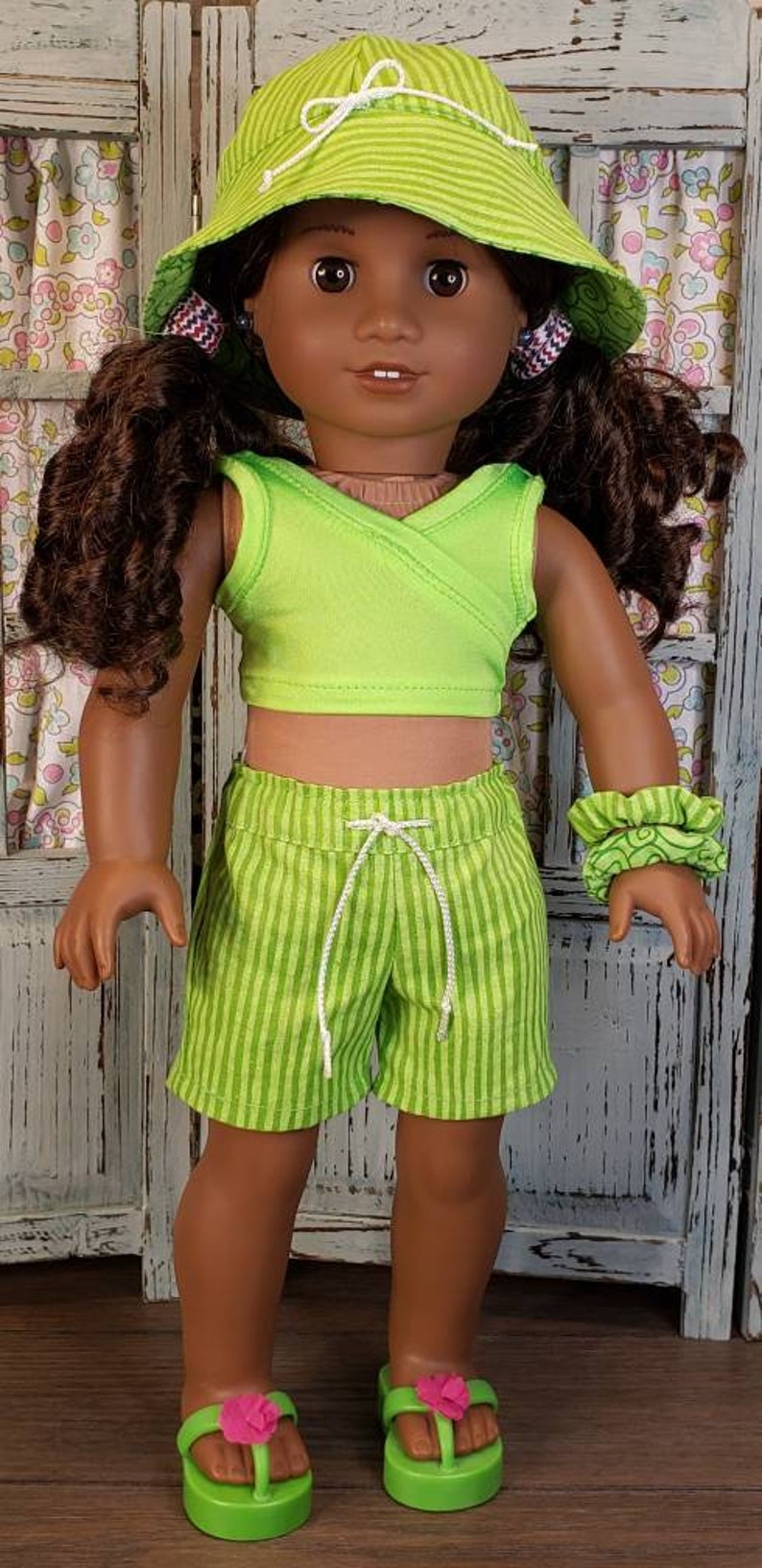 Surfer girl board shorts and swim top. Etsy