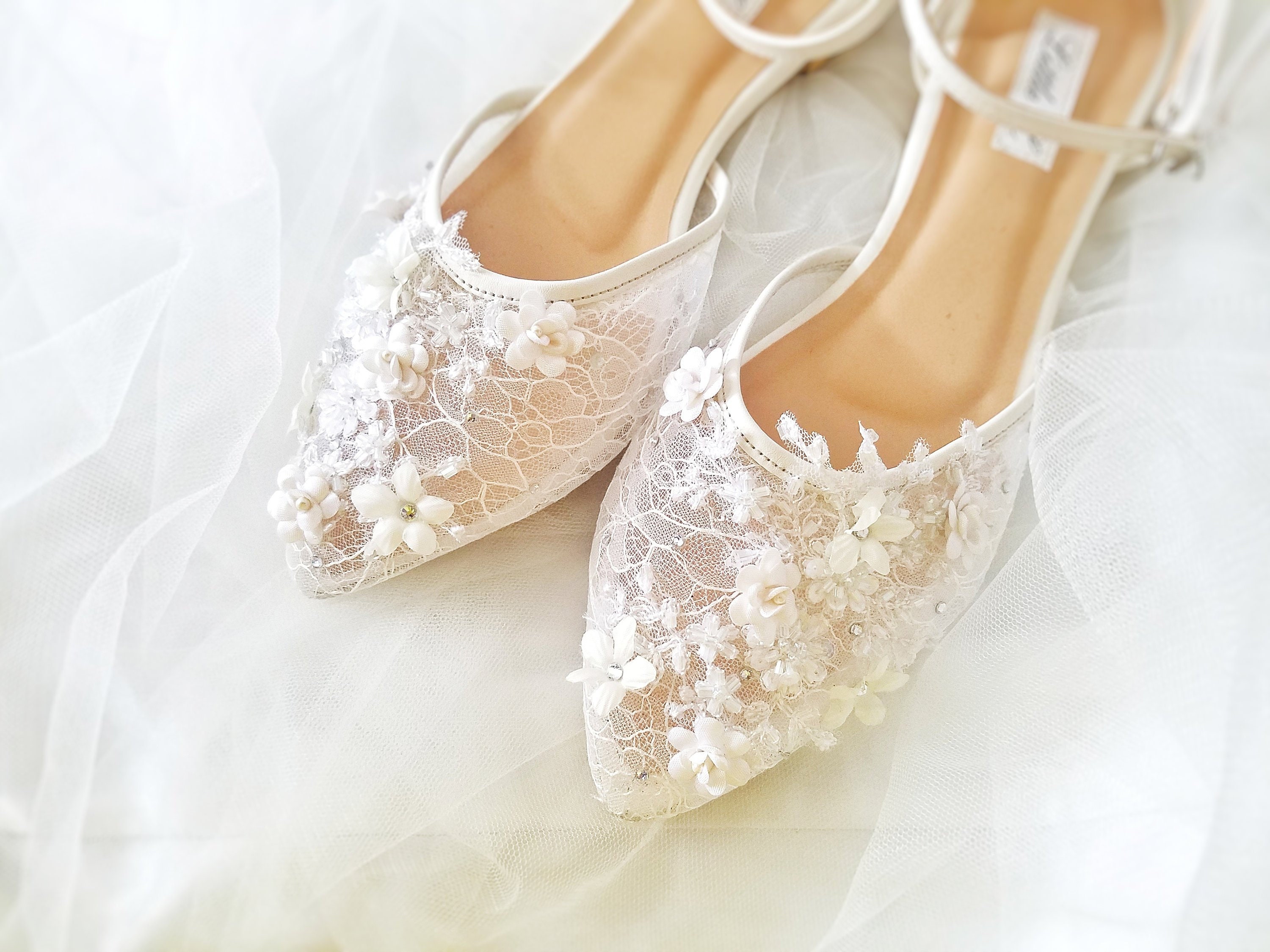 Buy > white flower shoes > in stock