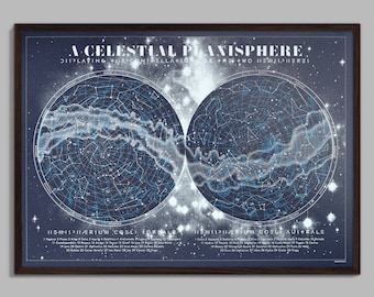 May include: A framed celestial planisphere print. The artwork features two circular star charts with constellations and celestial details in white and blue against a dark blue background. The text reads "A CELESTIAL PLANISPHERE".