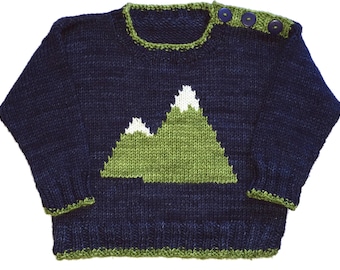 May include: A dark blue knitted sweater with a green trim and a green and white mountain design. The sweater has three buttons on the shoulder.