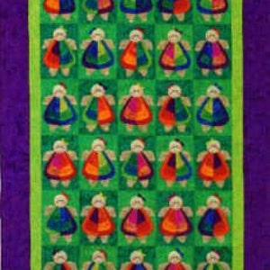 May include: A quilt with a green background and a border of purple fabric. The quilt is made up of 25 squares, each featuring a colorful, abstract design. The design is reminiscent of a stylized human figure.