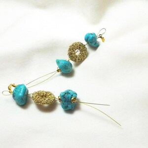 Earrings with bronze elements and turquoise stones