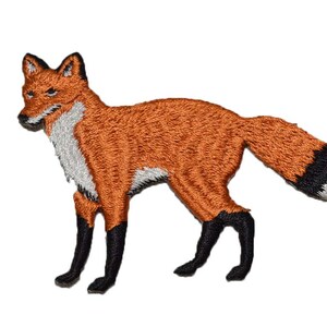 May include: Embroidered patch of a red fox in a side profile. The fox has a white chest, black legs, and a black-tipped tail. The fox is standing on a white background.