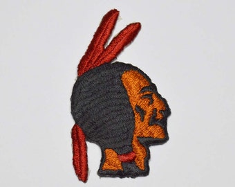 Iron on indian head: 2.0" (L) x 3.25" (H)