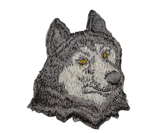 Iron on Siberian Husky: silver with yellow  2.25" (L) x 2.75" (H)