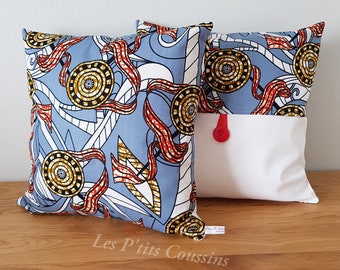 Wax cushion cover dominated by blue, wax accessory for living room decor, cushion in blue and white