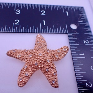 Swarovski Starfish Gold Tone Brooch with Crystals