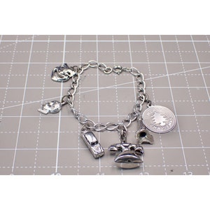 Sterling Silver Charm Bracelet with Mixed Metal Silver Charms
