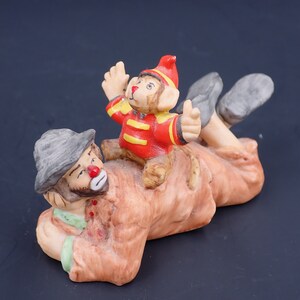 Flambro Vintage Porcelain Clown Figure Lying Down with Monkey on back