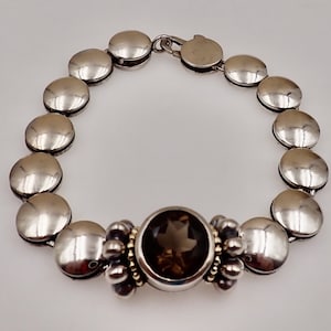 Retired Lagos Sterling Disc Bracelet with  18K Beaded Caviar Bezel Champagne Spinel Setting