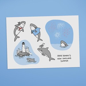 May include: A white print featuring cartoon sharks in various poses, including one with a lobster, another wearing a shirt, and one with a seagull. A lighthouse and fireworks are also depicted. The text "ANNE BONNY'S NEW ENGLAND SUMMER" is included.